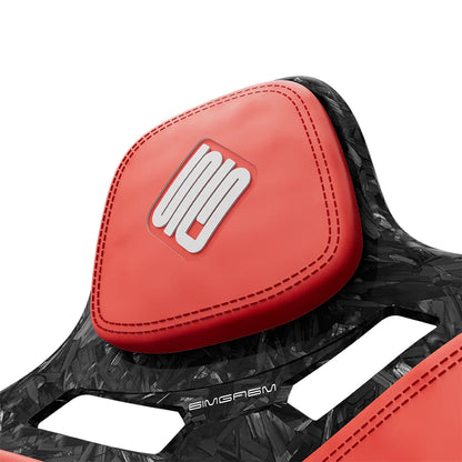 Close-up of the red headrest cushion on the SIMGASM Atlas Formula seat with a Forged Carbon Look shell