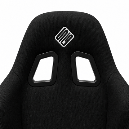 Close-up of the SIMGASM Core bucket seat headrest and twin harness openings