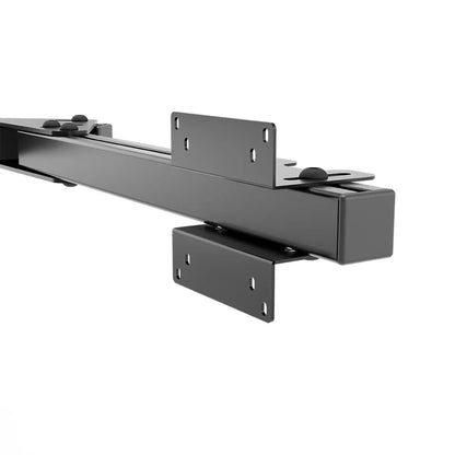 Close-up of a SIMGASM Core side arm showing the VESA 75/100 plate and slotted adjustment hardware